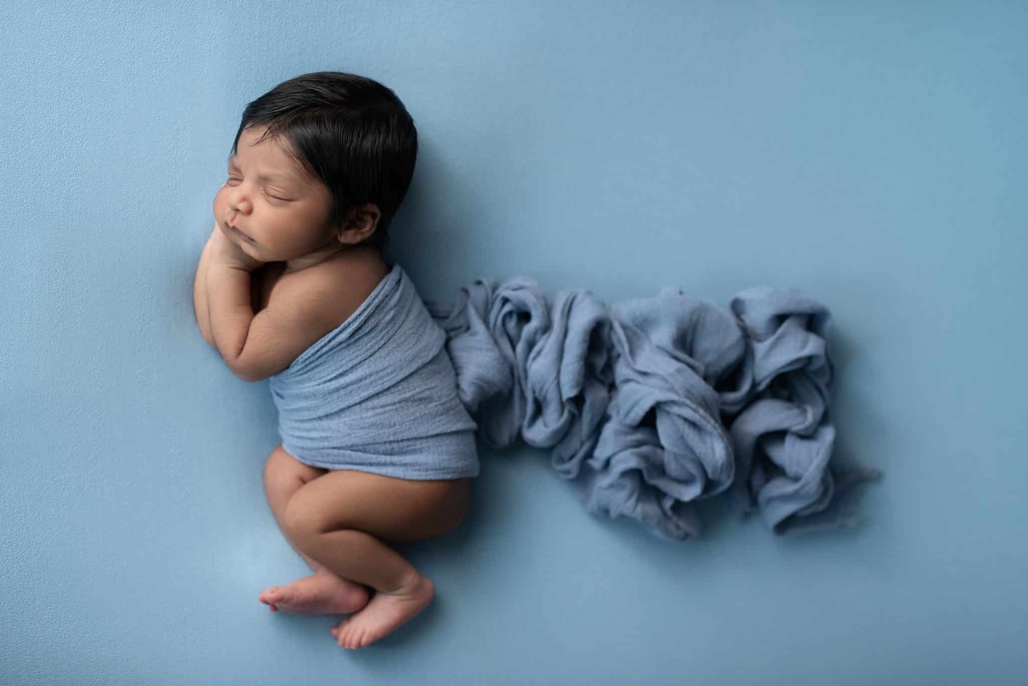 Toronto lifestyle newborn photography with newborn baby and family dogs in rustic setup