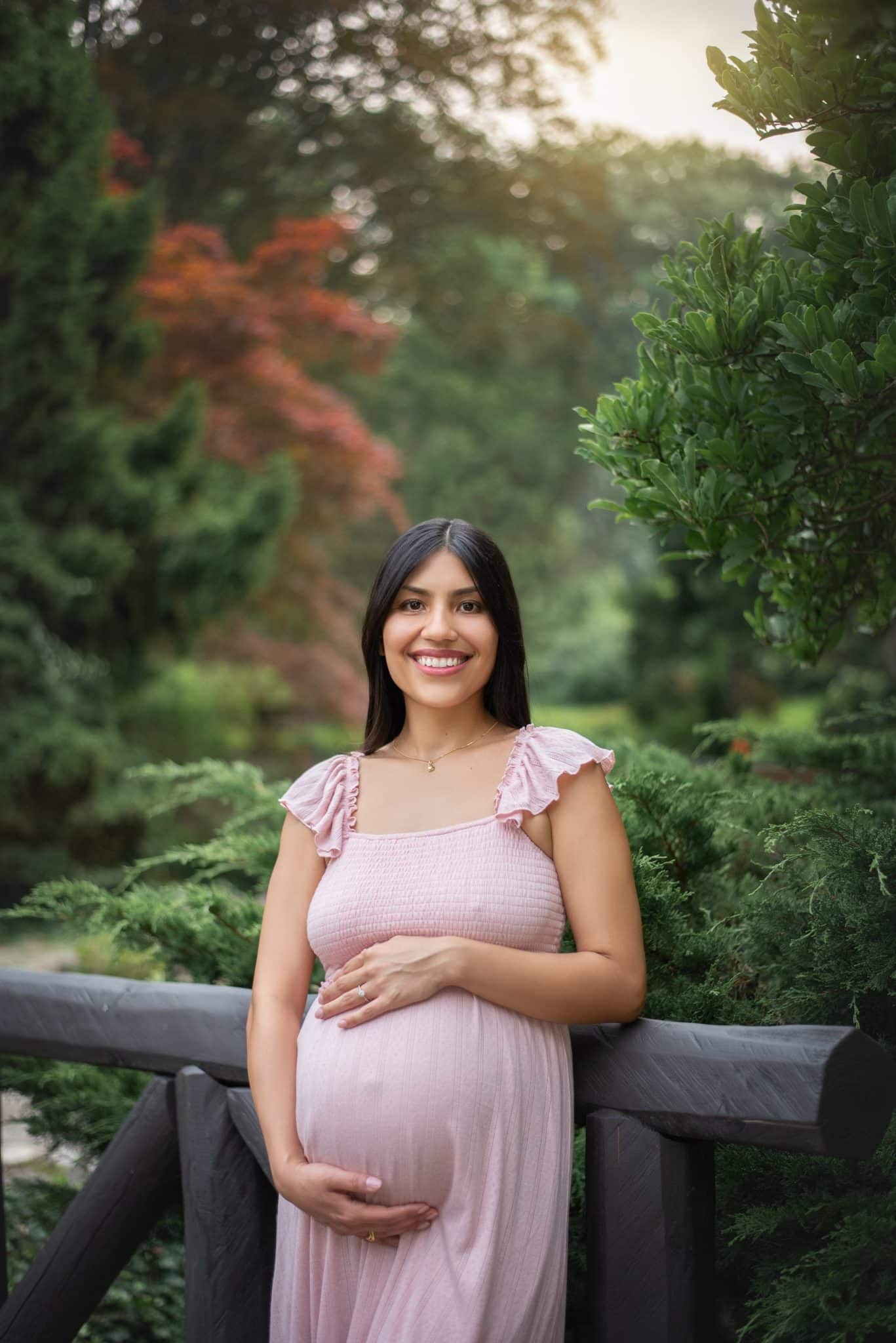 Happy mom to be during pregnancy photoshoot in Toronto