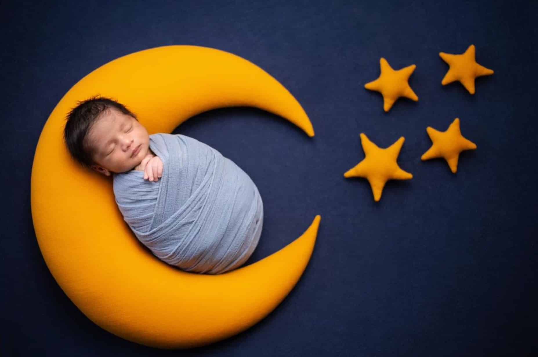 Newborn photography Toronto – delicate newborn portrait with soft cream and brown tones